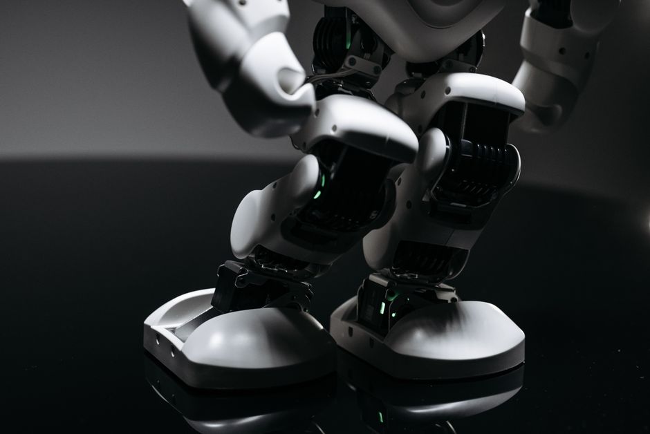 macro shot of the robot arm and 3‑axis gimbal mechanism extending from the Honor Robot Phone, editorial tech still life, neutral background