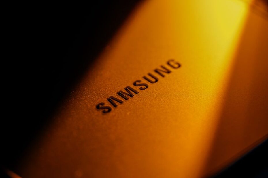 close-up of Samsung smartphone keyboard with glowing AI icon, still life editorial tech style, macro shot