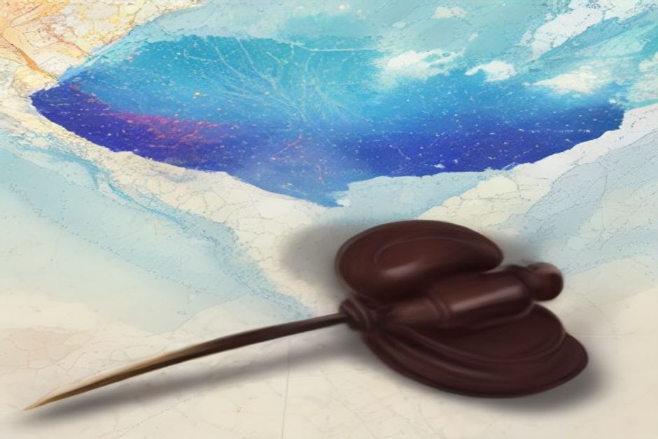 abstract illustration of a gavel over a digital map of the United States